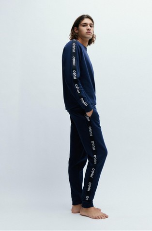 HUGO Tracksuit bottoms in organic cotton with logo tape Emporium