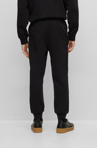 BOSS - Cotton-terry tracksuit bottoms with stripes and logo